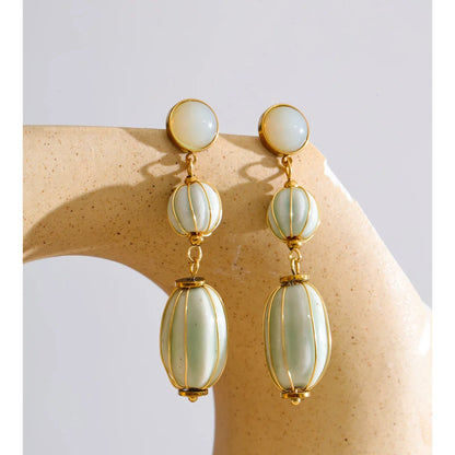Brinco Longo Dourado com Madrepérola Champagne Feminino Elegant
